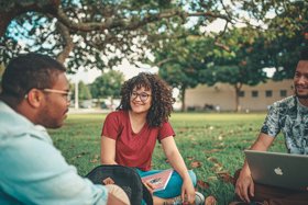 Students sat outside chatting image