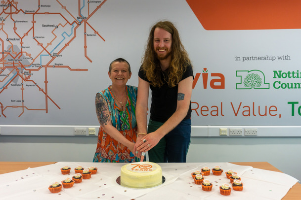 Lesley Fixter (Left) and colleague Russell Stephens  cutting the cake to celebrate 70 years of crossing patrols