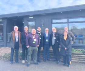 Members and staff stood outside Berry Hill Primary School. 