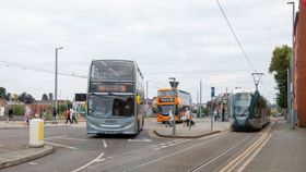 Two buses and a tram in Beeston